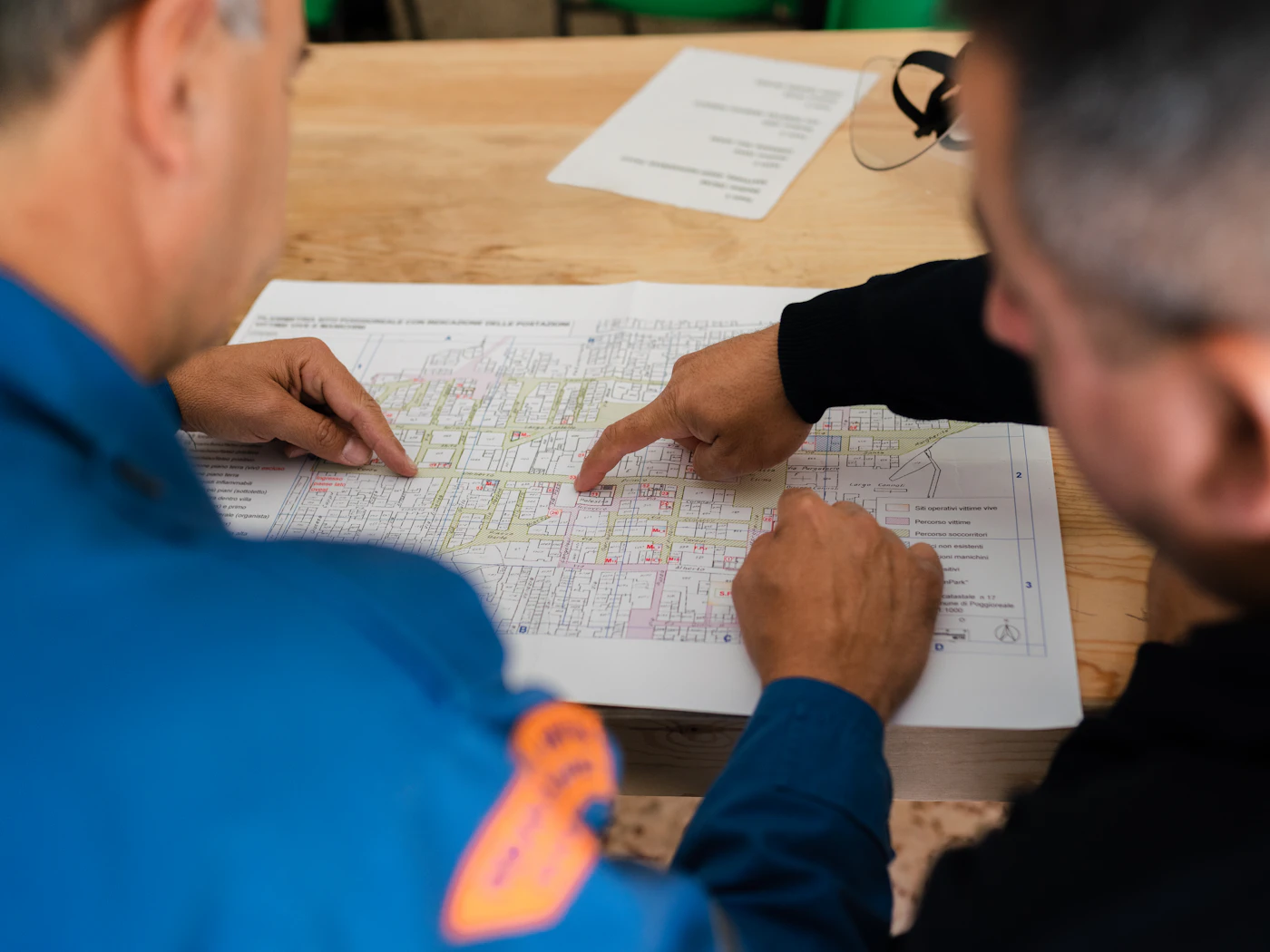 Planners reviewing a construction programme